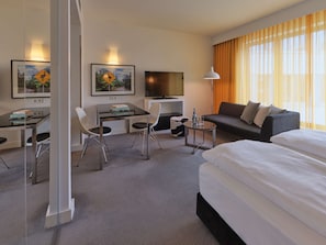Hypo-allergenic bedding, pillow-top beds, in-room safe