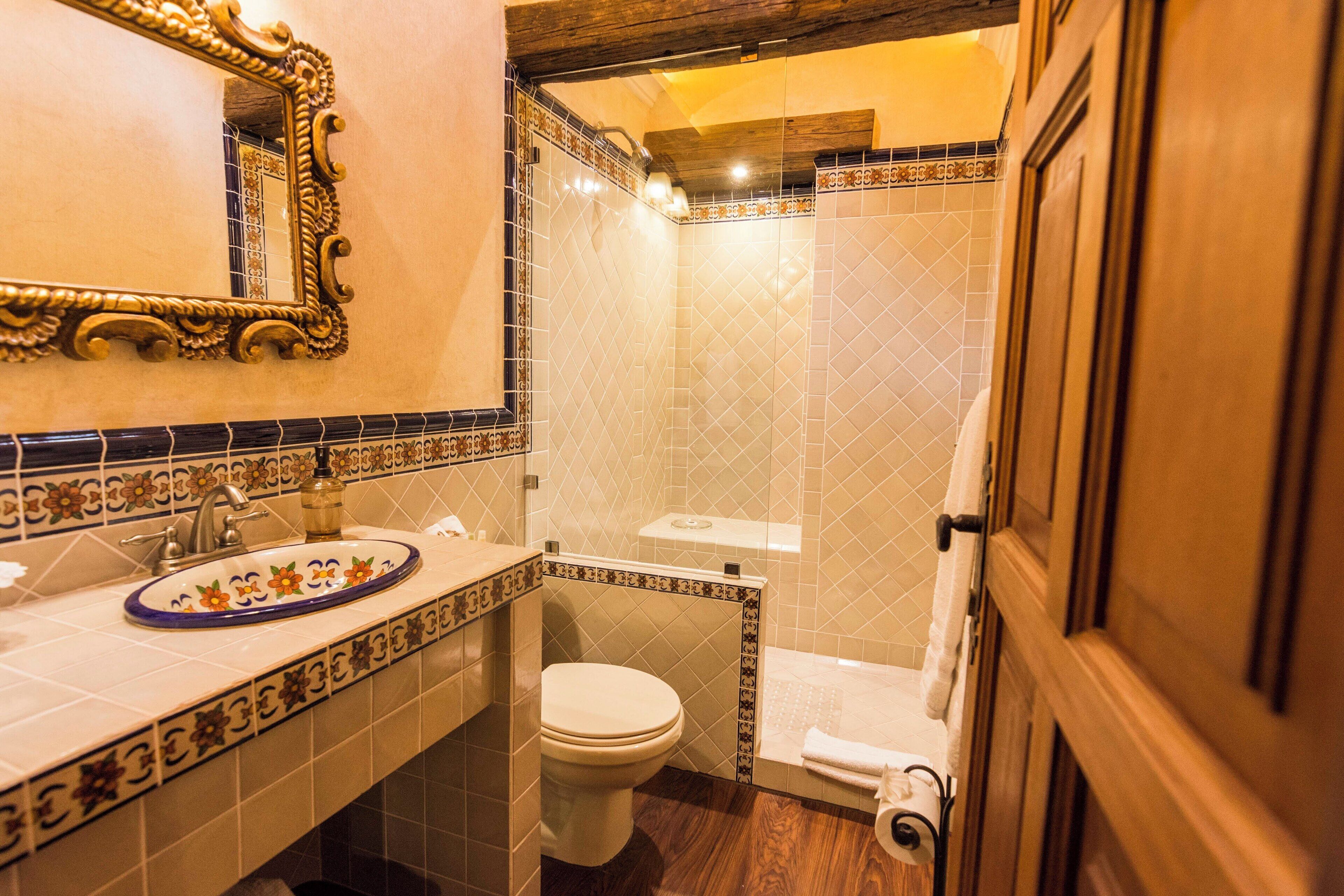 shower, hair dryer, bathrobes, slippers