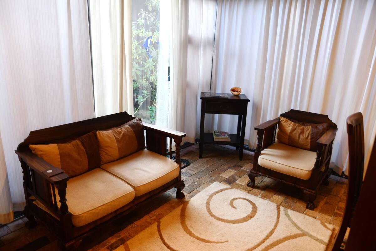 Comfort Suite, 1 Bedroom, Ground Floor | Living area | Flat-screen TV