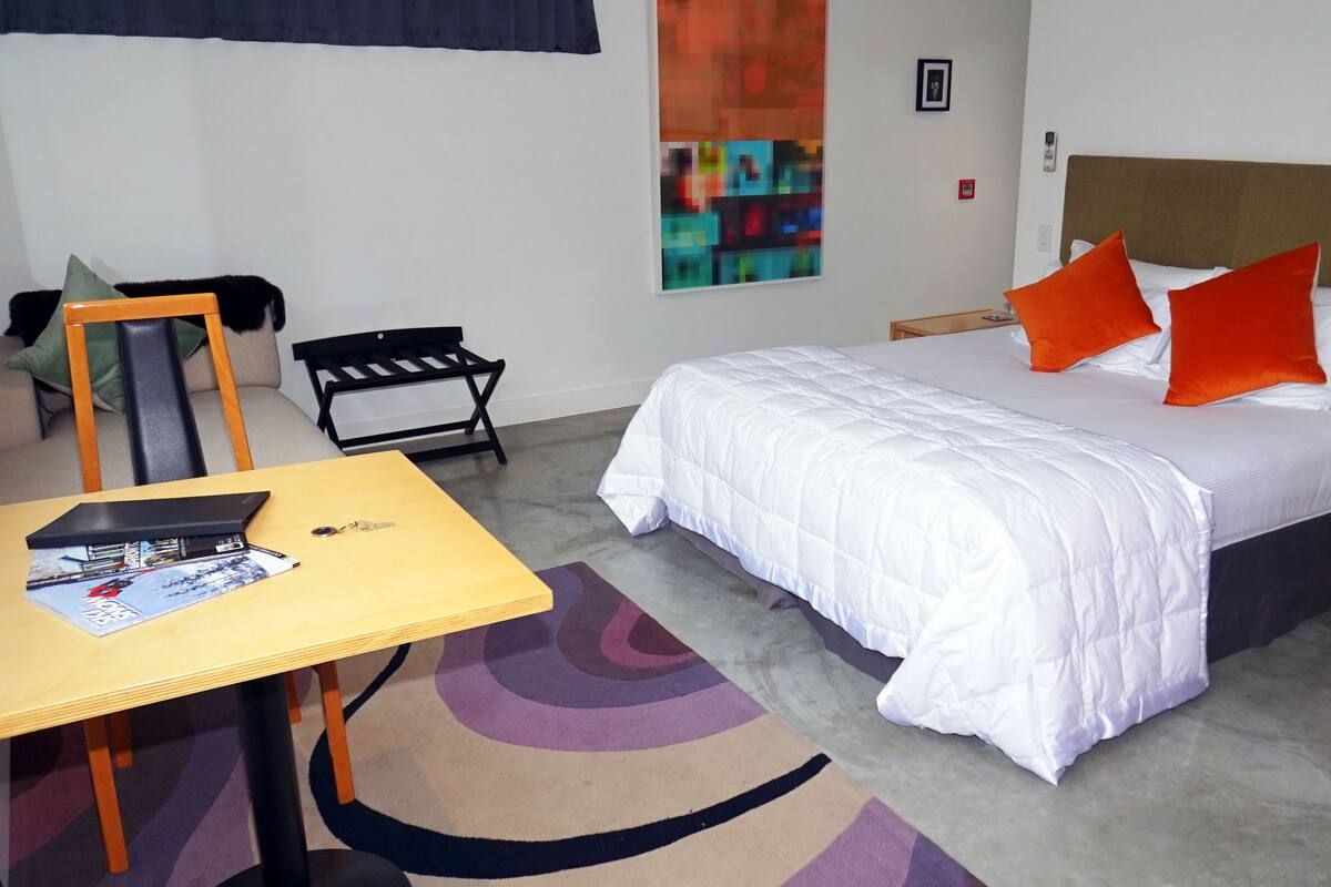 Hebe Suite | Premium bedding, down comforters, in-room safe, desk