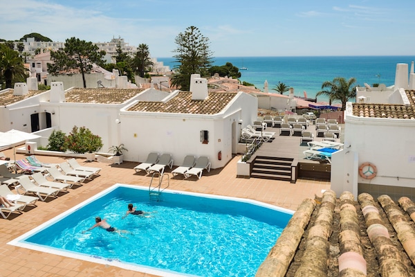 2 outdoor pools, pool umbrellas, sun loungers