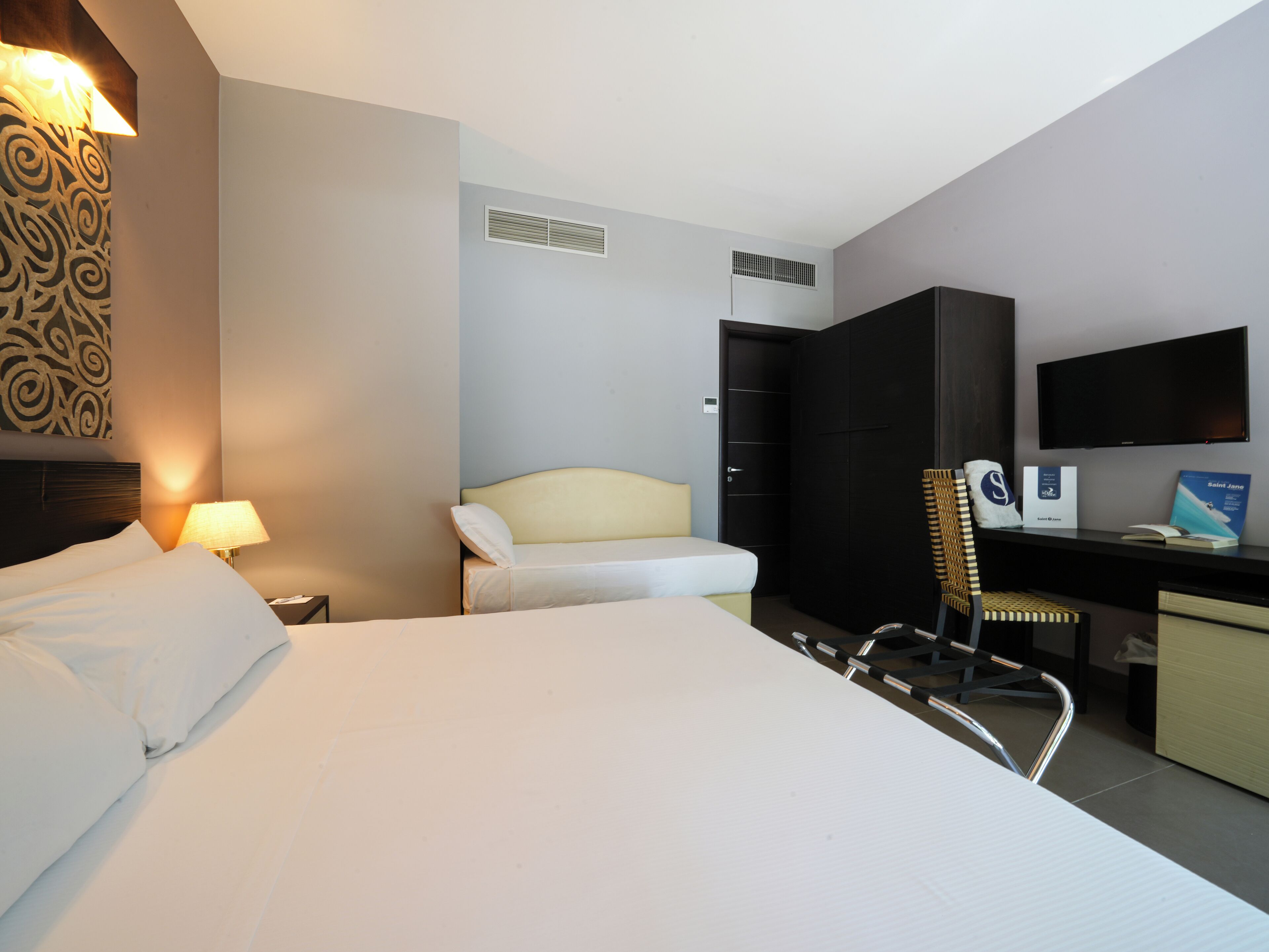 triple room (for 2 adult and 1 child max 7 years ) | pillow-top beds, minibar, in-room safe, desk