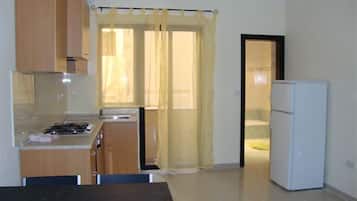 Standard Apartment, 2 Bedrooms | Private kitchen | Fridge, coffee/tea maker, cookware/dishes/utensils