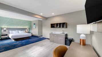 Desk, laptop workspace, blackout curtains, iron/ironing board