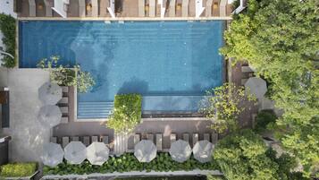 Executive Studio | Outdoor pool | 3 outdoor pools, open 7 AM to 9 PM, pool umbrellas, sun loungers