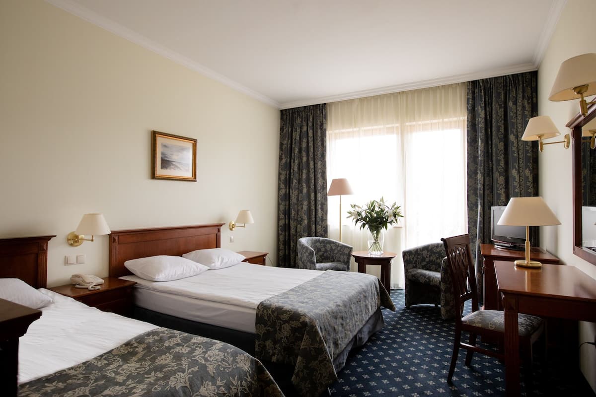 triple room | in-room safe, individually decorated, desk, laptop workspace