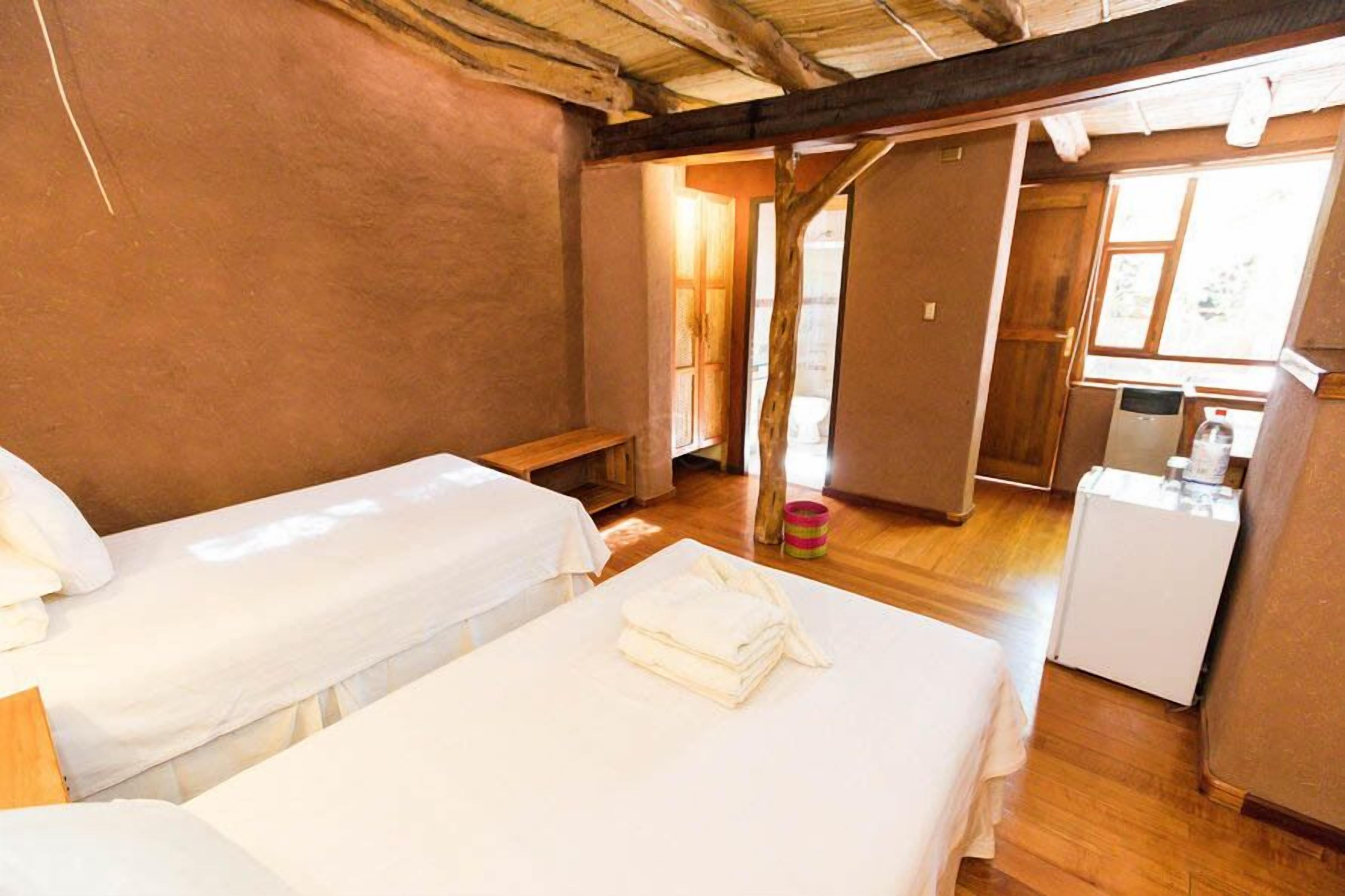 classic twin room | 1 bedroom, minibar, in-room safe, individually decorated