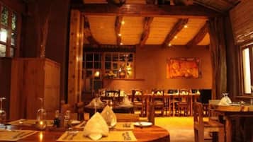 Breakfast, lunch, dinner served; international cuisine, pool views