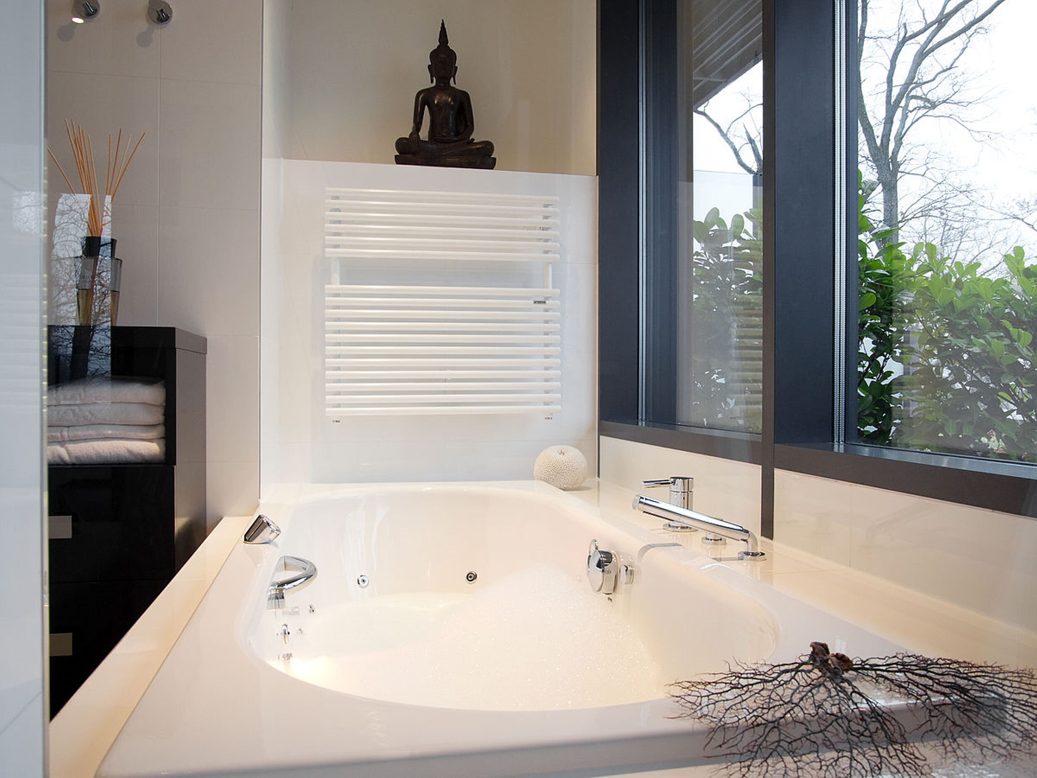 designer toiletries, hair dryer, bathrobes, slippers