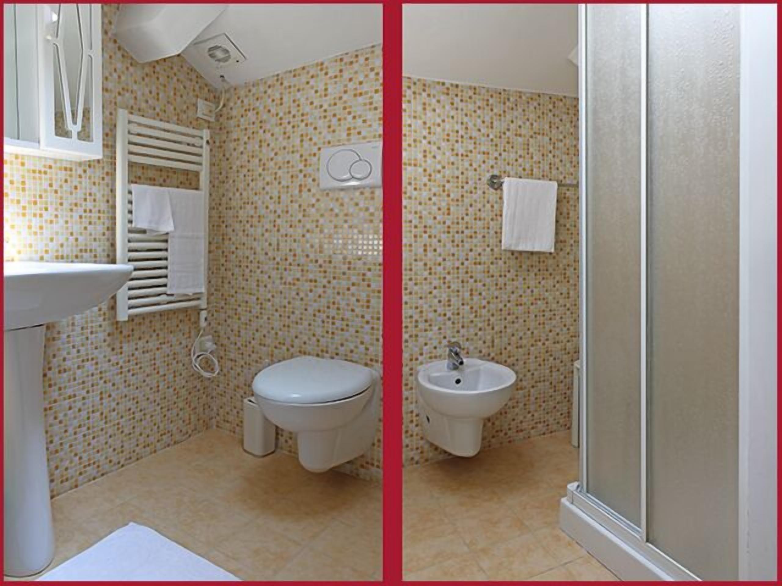 single room | bathroom | shower, hair dryer, towels