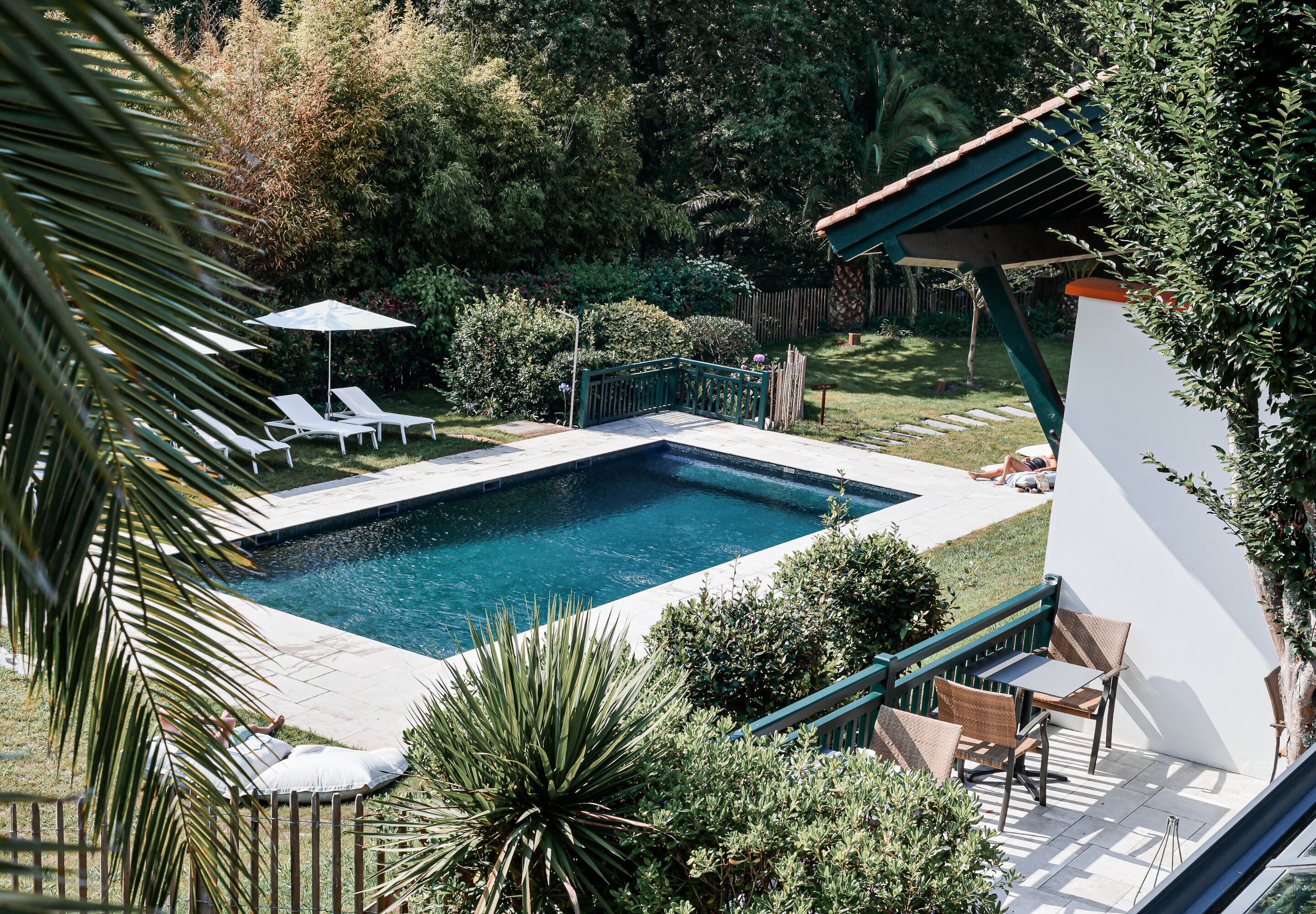 seasonal outdoor pool, open 8:00 am to 9 pm, pool umbrellas