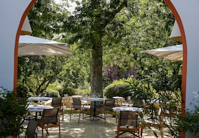 Lunch, dinner served; French cuisine, garden views