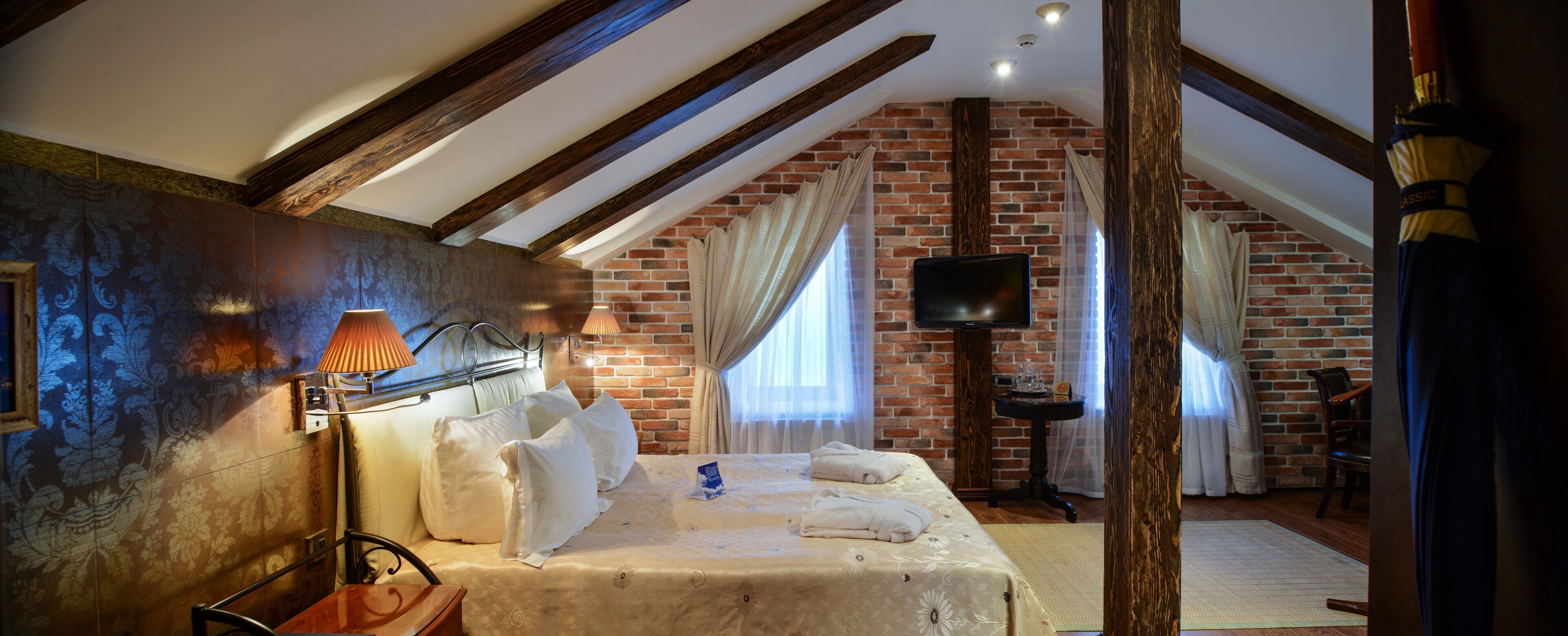 Habitació doble clàssica | Roba de llit d'alta qualitat, minibar i caixa forta a l'habitació 