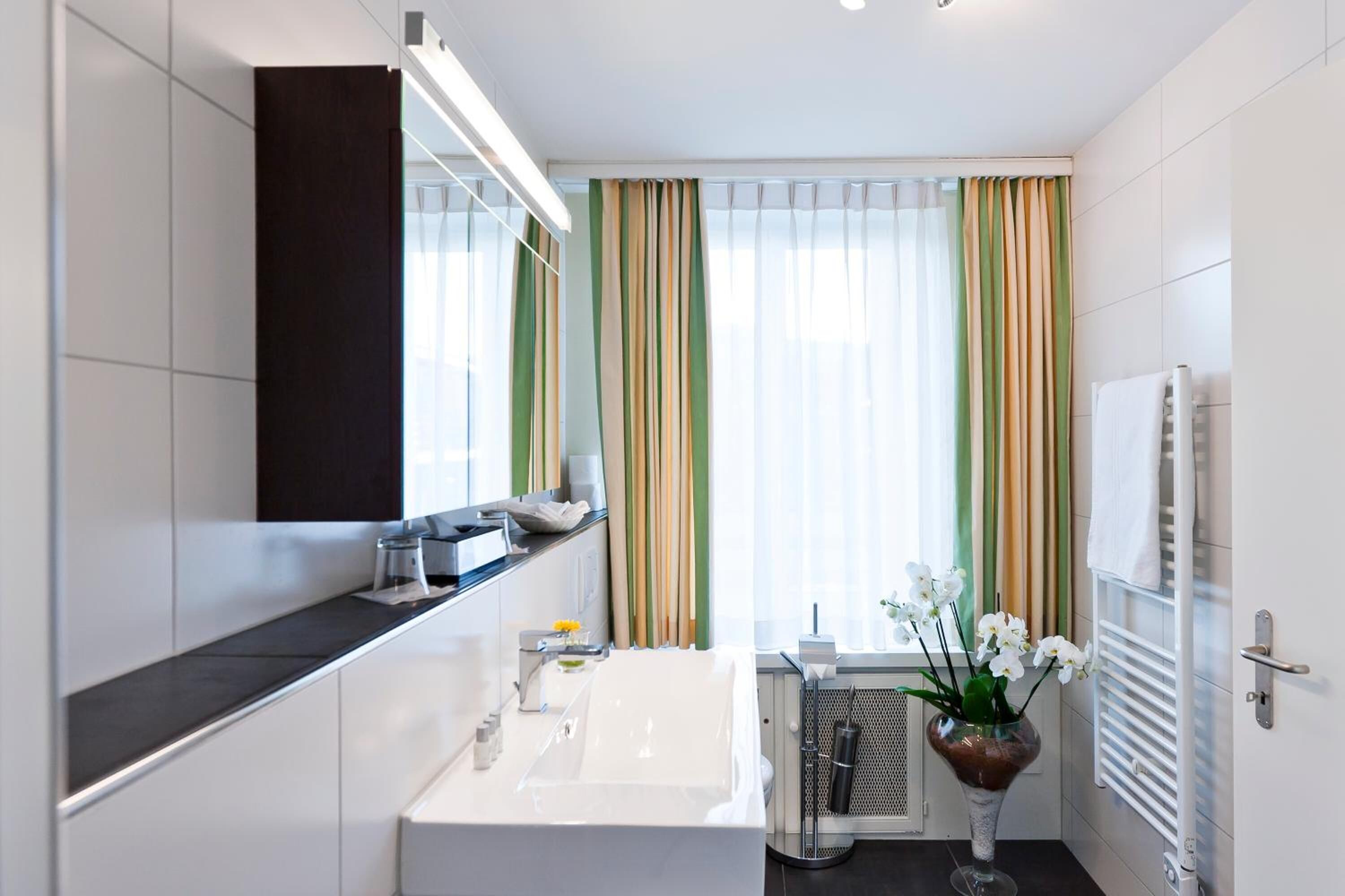 comfort room | bathroom | free toiletries, hair dryer, bathrobes, towels