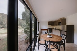 Full-sized fridge, microwave, stovetop, dishwasher