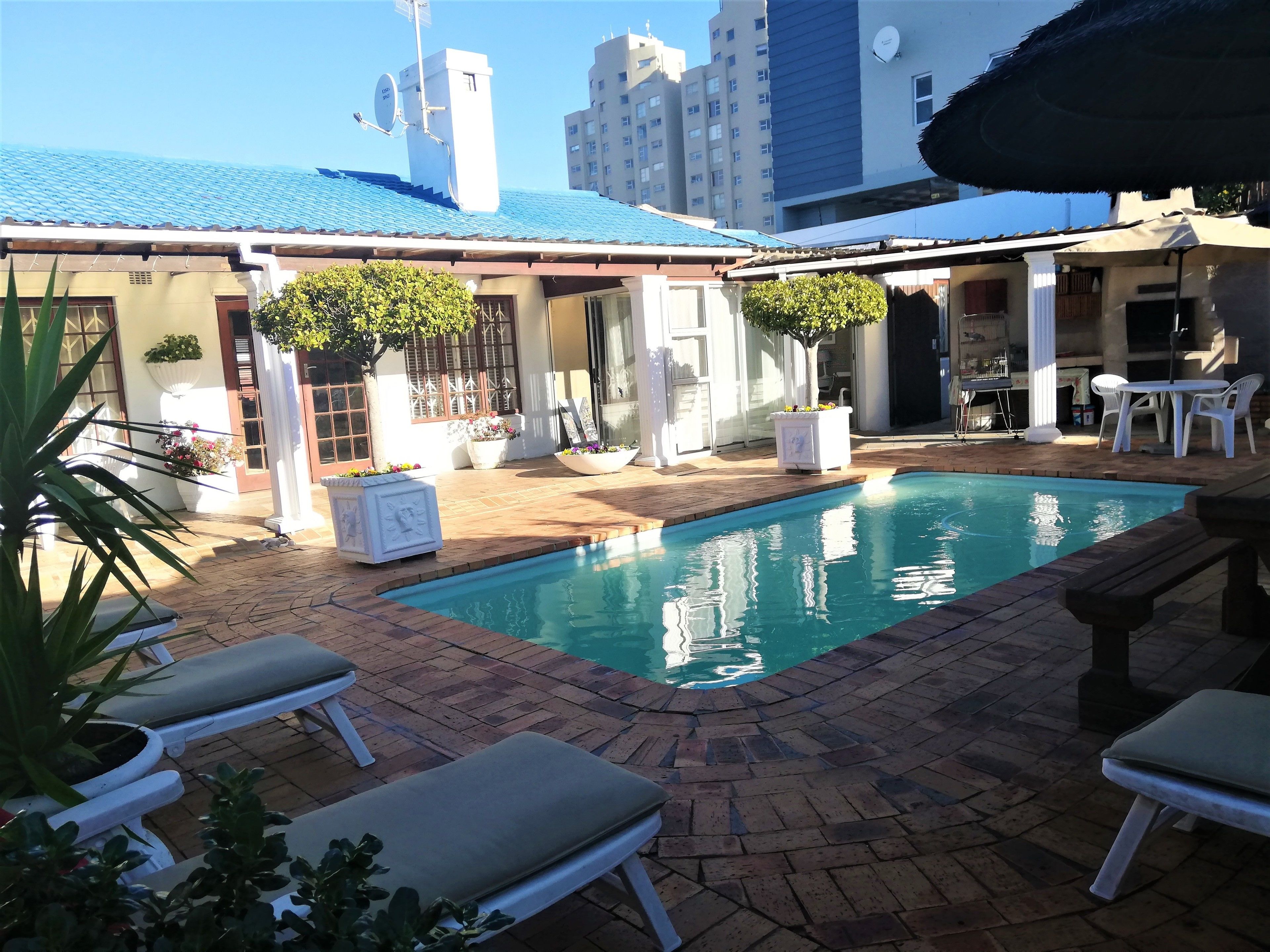 Outdoor pool, open 10:30 AM to 6:30 PM, pool umbrellas, sun loungers