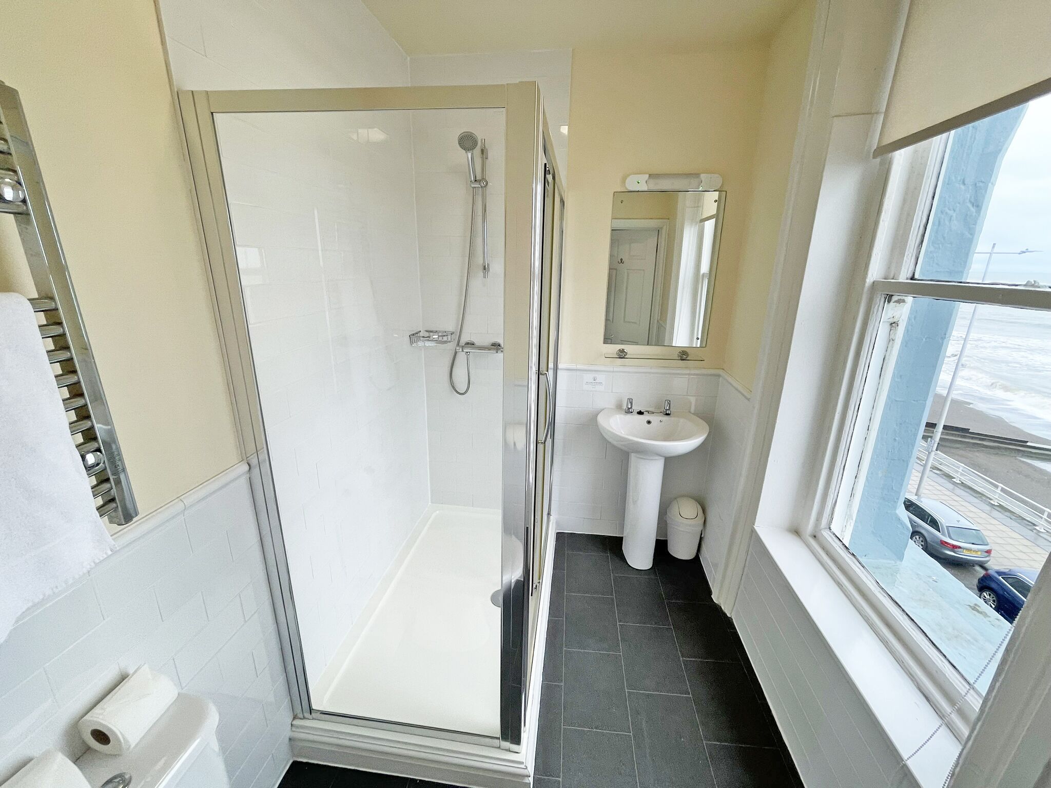 family room | bathroom | shower, hair dryer, towels