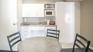 Suite, 2 Bedrooms | Private kitchen | Fridge, microwave, coffee/tea maker, electric kettle