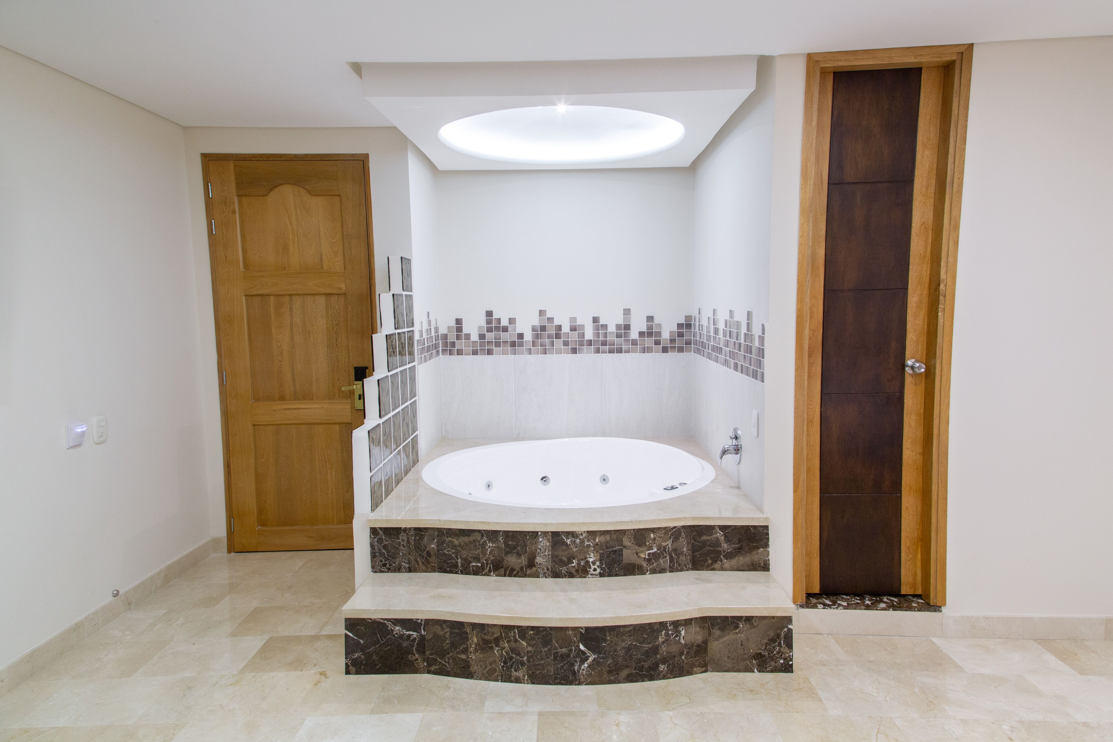 deluxe room, jetted tub | private spa tub