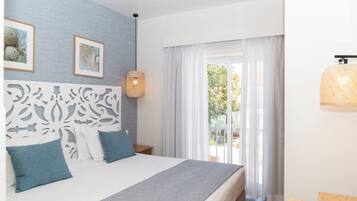 Standard Double Room, City View | Minibar, blackout curtains, iron/ironing board, free WiFi