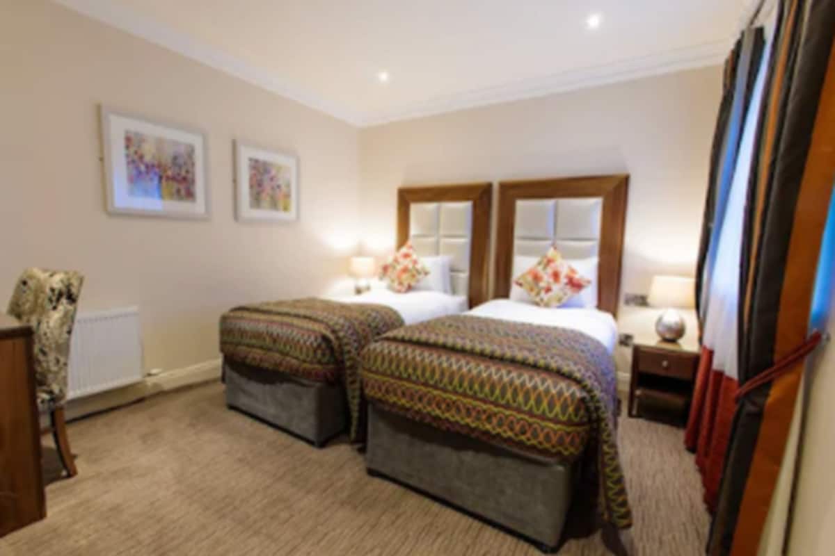 Desk, iron/ironing board, free WiFi, bed sheets