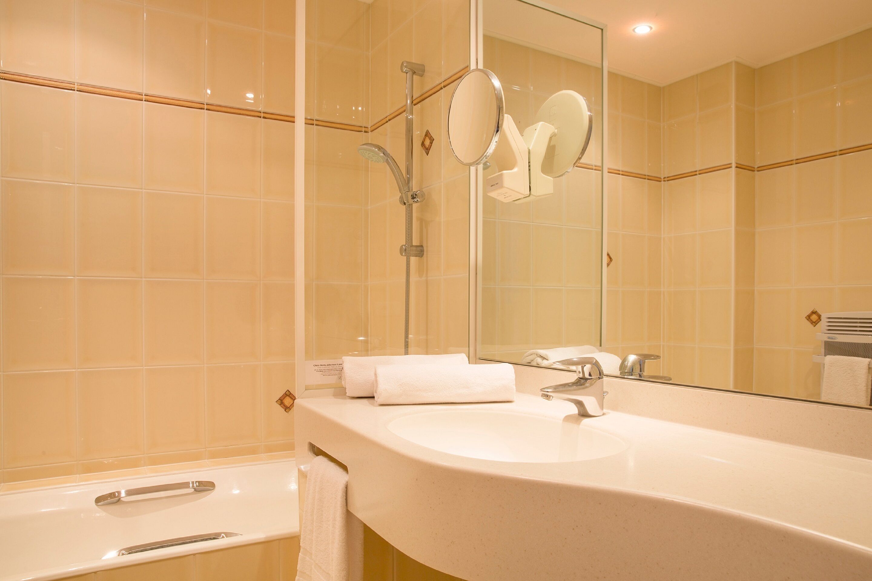 comfort room | bathroom | hair dryer, towels, soap, shampoo