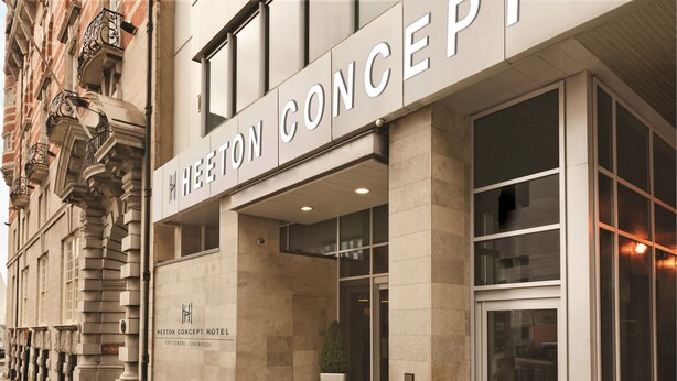 The exterior of the Heeton Concept Hotel, featuring a modern facade with large windows and a stone base. - Heeton Concept Hotel City Centre Liverpool (Liverpool)