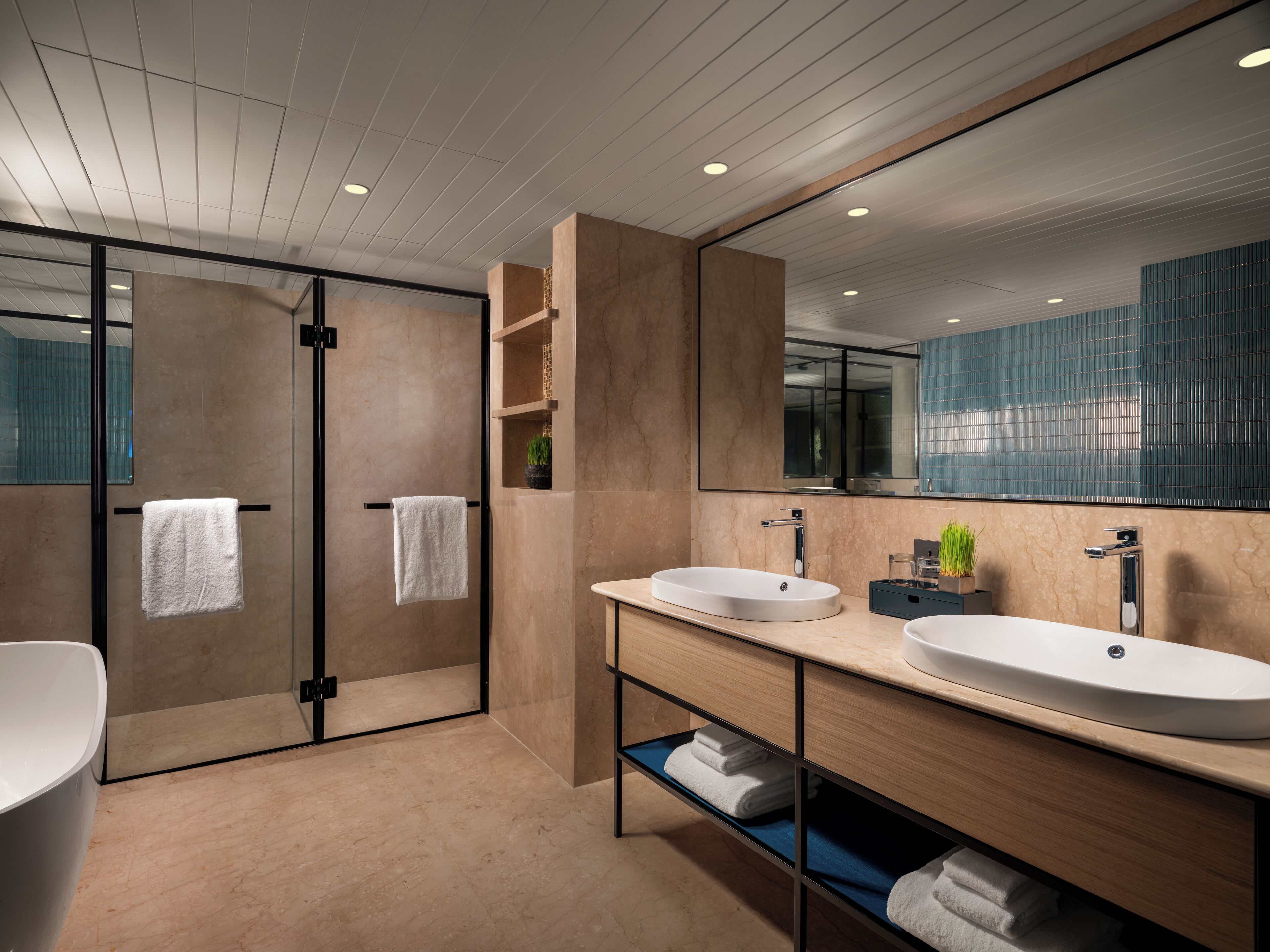 superior suite, 1 king bed | bathroom | designer toiletries, hair dryer, bathrobes, slippers