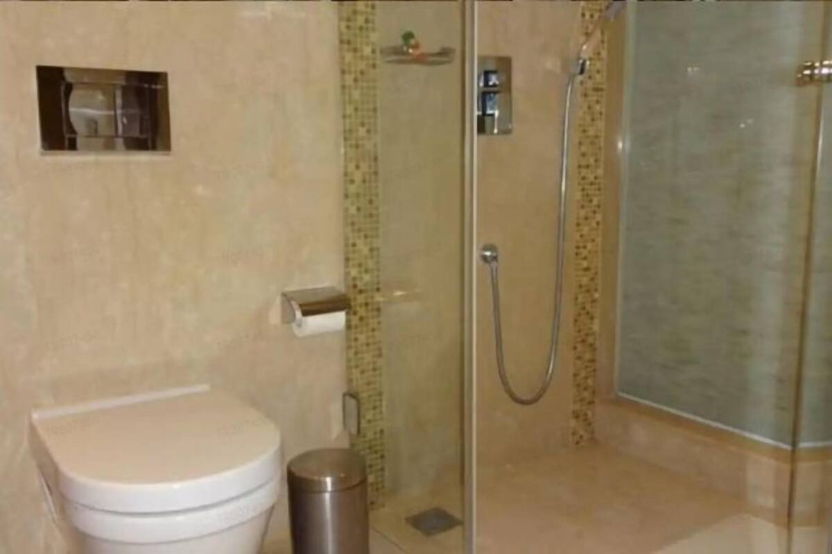 Bathroom | Designer toiletries, hair dryer, bathrobes, slippers