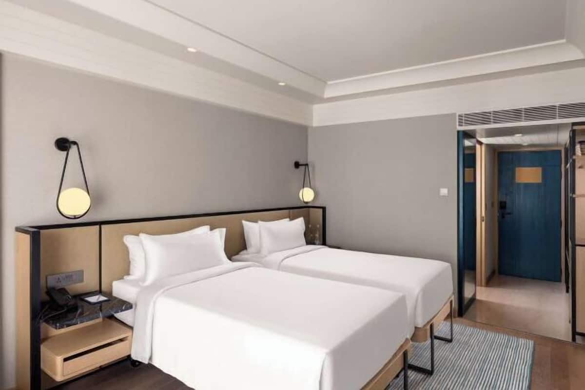 Roupas de cama premium, camas Select Comfort, frigobar