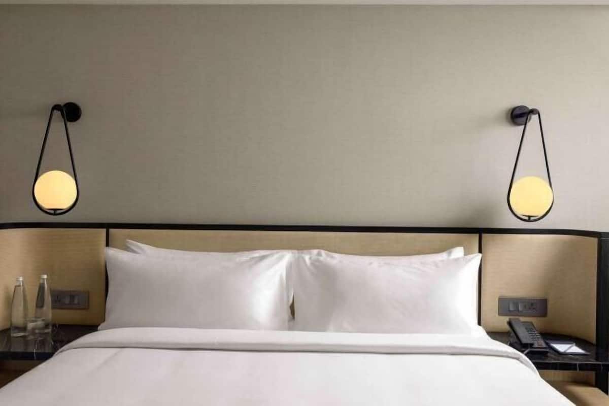 Roupas de cama premium, camas Select Comfort, frigobar