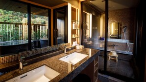 A modern bathroom with two sinks, a large mirror, and a view of a balcony. - Nakanobo Zuien - Adults Only (Kobe)