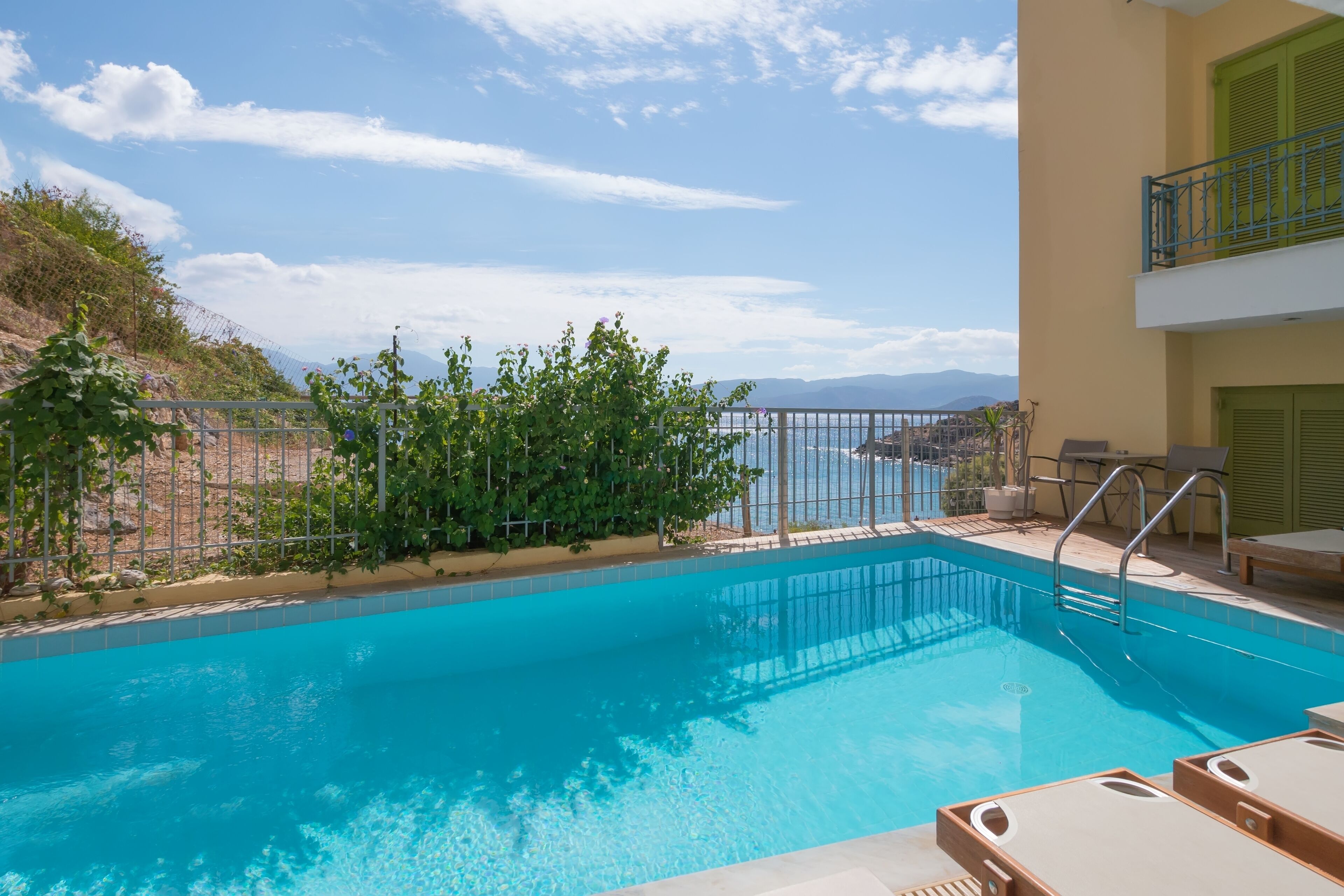 seasonal outdoor pool, pool umbrellas, pool loungers