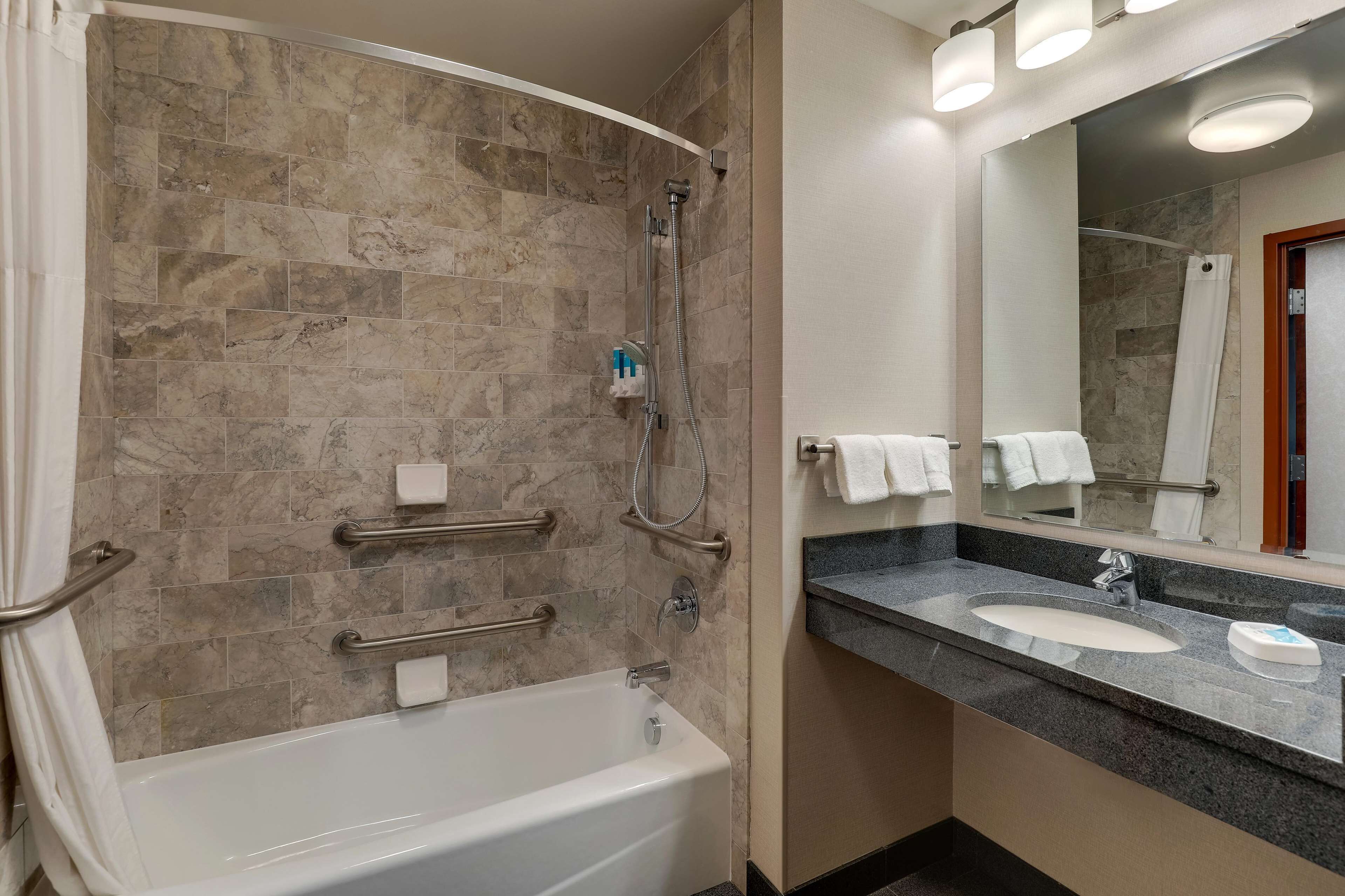 combined shower/bathtub, free toiletries, hair dryer, towels