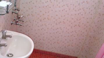 Shower, free toiletries, hair dryer, slippers