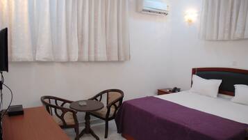 Premium bedding, down duvets, Select Comfort beds, minibar