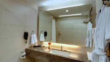 Executive Suite, 1 King Bed | Bathroom | Shower, free toiletries, hair dryer, slippers