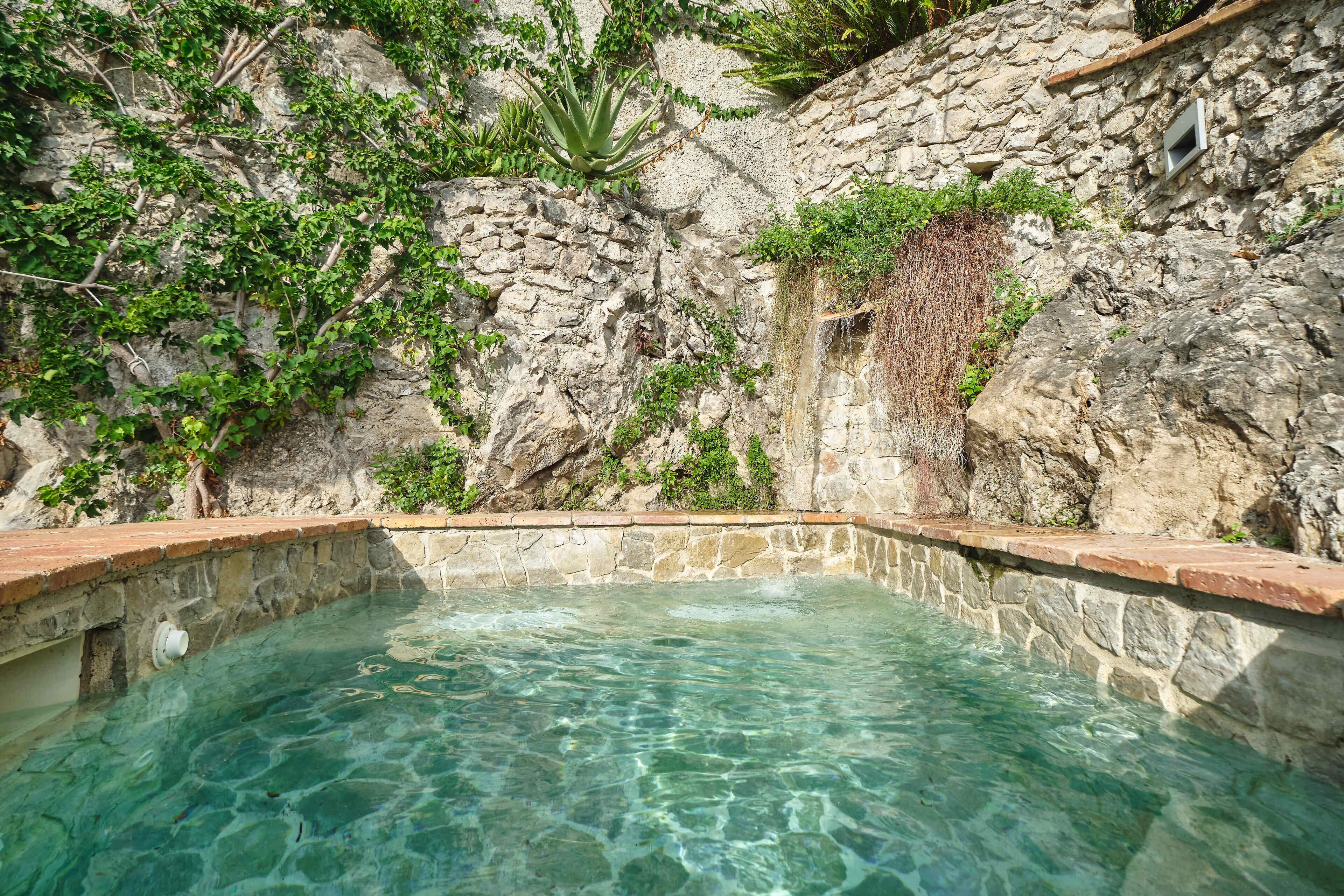 outdoor pool, open 10 am to 7 pm, pool umbrellas, pool loungers