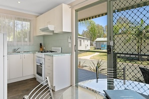 Banksia 2 Bedroom Cabin | Private kitchen | Fridge, microwave, stovetop, coffee/tea maker