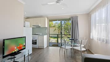 Banksia 2 Bedroom Cabin | Living area | Flat-screen TV