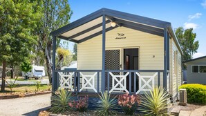A small, single-story structure with a covered porch and a door labeled "Jayco." - BIG4 Moama Holiday Park (Moama)