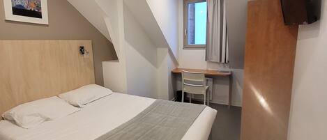 Bureau, rideaux occultants, chambres insonorisées