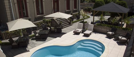 Seasonal outdoor pool, pool umbrellas, sun loungers