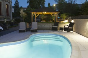 Seasonal outdoor pool, pool umbrellas, pool loungers