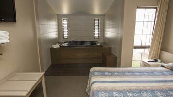 Apartment, 1 Bedroom, Jetted Tub | In-room safe, individually decorated, desk, soundproofing
