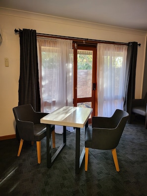 Queen Spa Room | Desk, iron/ironing board, bed sheets, wheelchair access