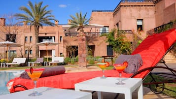 Outdoor pool, pool umbrellas, pool loungers