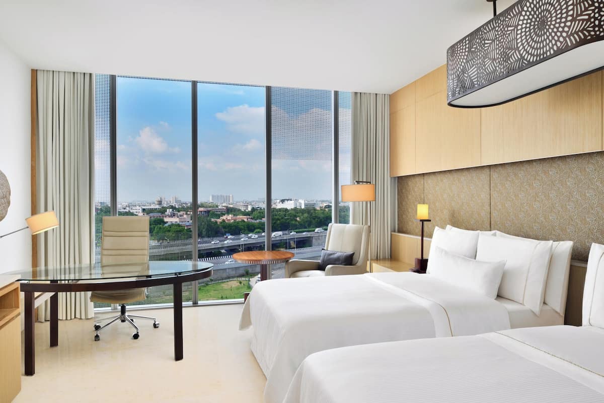 Egyptian cotton sheets, down comforters, pillowtop beds, minibar