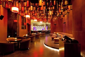 3 bars/lounges, rooftop bar, pub