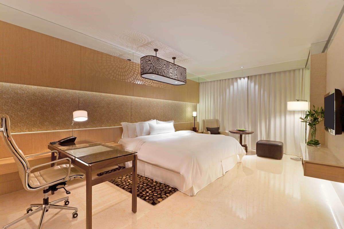 Egyptian cotton sheets, down comforters, pillowtop beds, minibar